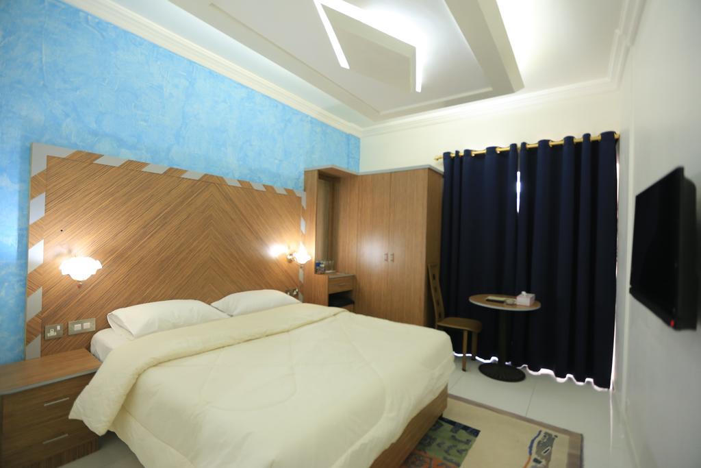 Sun City International Hotel Dubai Phòng bức ảnh